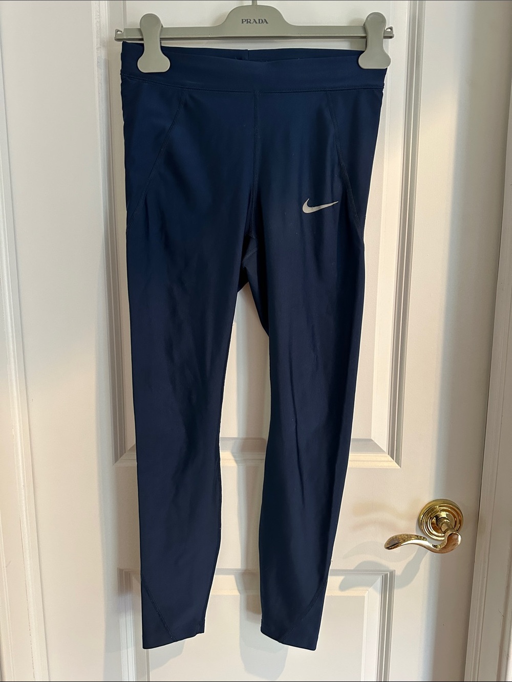 Nike Running Dark Blue Performance Leggings with Silver Swoosh, side pockets
